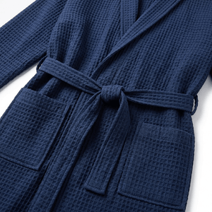 Navy blue waffle robe with a belt